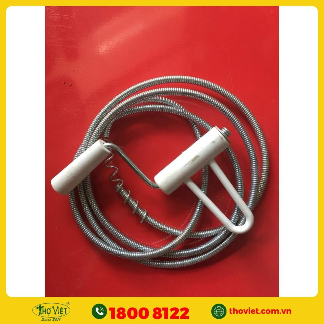 Thông tắc cống thoát sàn bằng dây lò xo