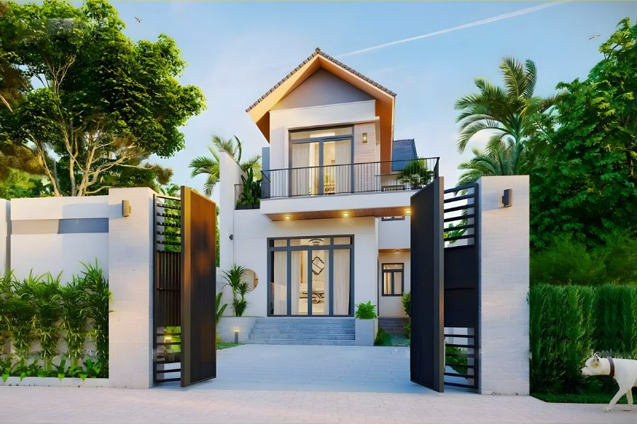 Mẫu nhà 2 tầng nông thôn 800 triệu mái Thái sang trọng có cổng sắt lớn và ban công thoáng.