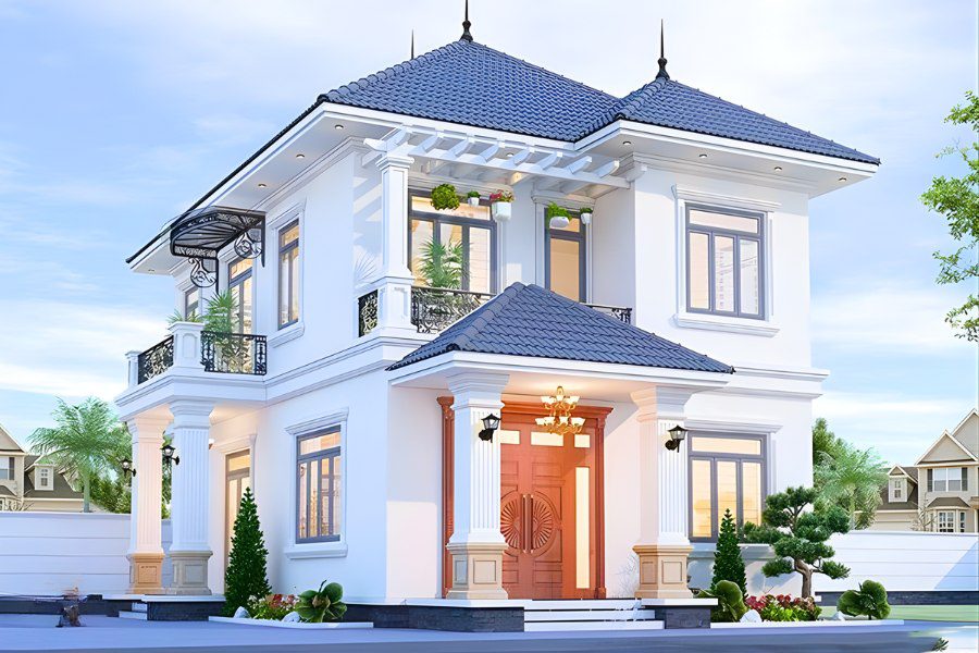 Mẫu biệt thự 2 tầng mái Nhật hiện đại, tông trắng, có ban công và lan can sắt uốn cong.