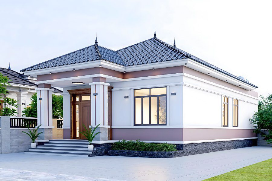 Mẫu nhà cấp 4 mái Nhật sang trọng, màu trắng kem và nâu đất, sảnh có cột trụ lớn.