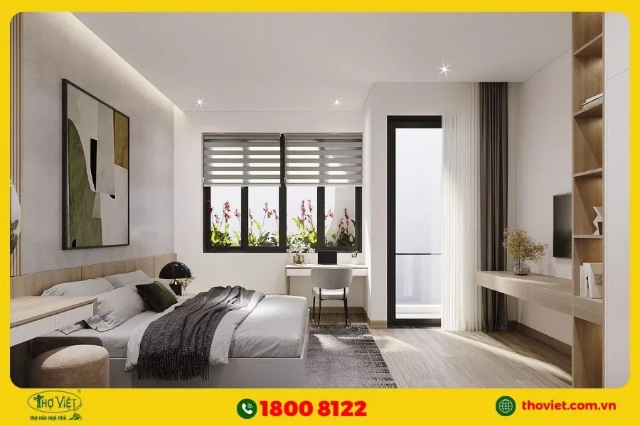 Phòng ngủ có bàn làm việc đơn giản